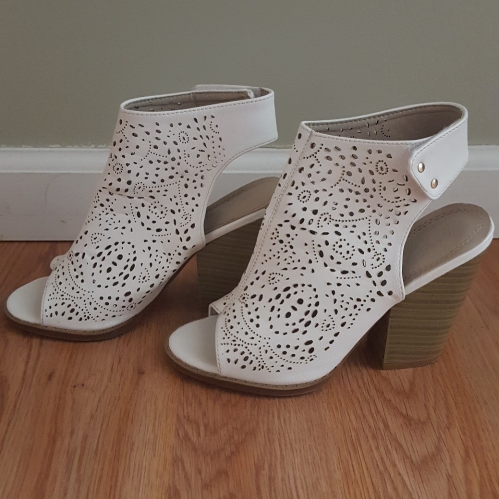 White designed cut out booties